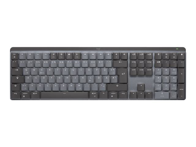 Die elegante graue Logitech MX Mechanical mechanische tastatur mit leuchtenden Tasten auf einem dunklen Schreibtisch.