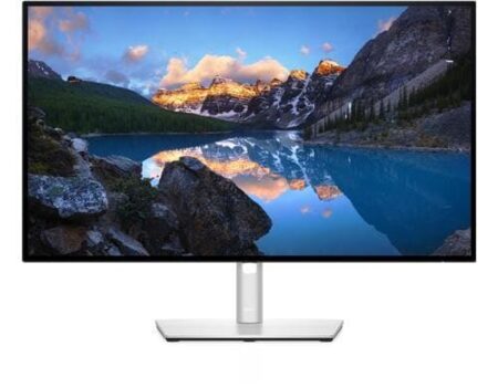 Ein Dell UltraSharp U2722DE monitor für profis auf einem modernen Schreibtisch mit klarer Farbdarstellung.
