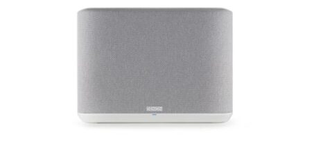 Leistungsstarker kabelloser lautsprecher denon home 250 weiß auf einem modernen Möbel mit elegantem Design und hochwertiger Verarbeitung