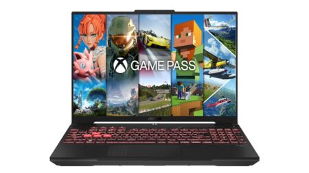 Ein robuster schwarzer asus tuf f16 Gaming-Laptop mit leuchtendem 165Hz Display auf einem modernen Gaming-Schreibtisch.