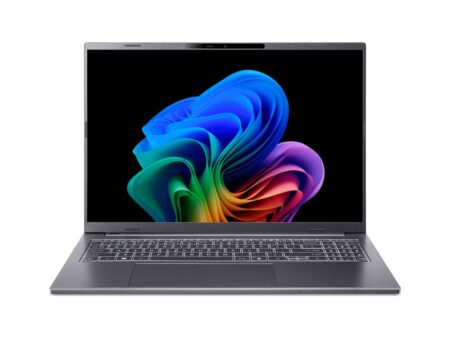 Ein eleganter acer aspire 16 ai Laptop mit einem leuchtenden OLED-Display und der Copilot-Taste auf der Tastatur in einer modernen Büroumgebung.